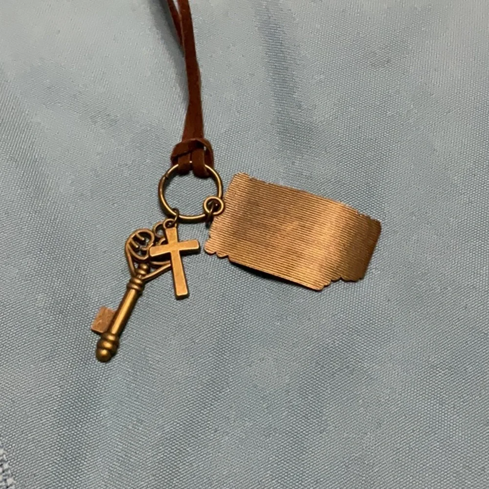Gold Tone Necklace: Cross, Key, and Ancient Tag on Leather Cord